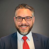 Senior Claims Executive Michael Chanouzas (MCZ)